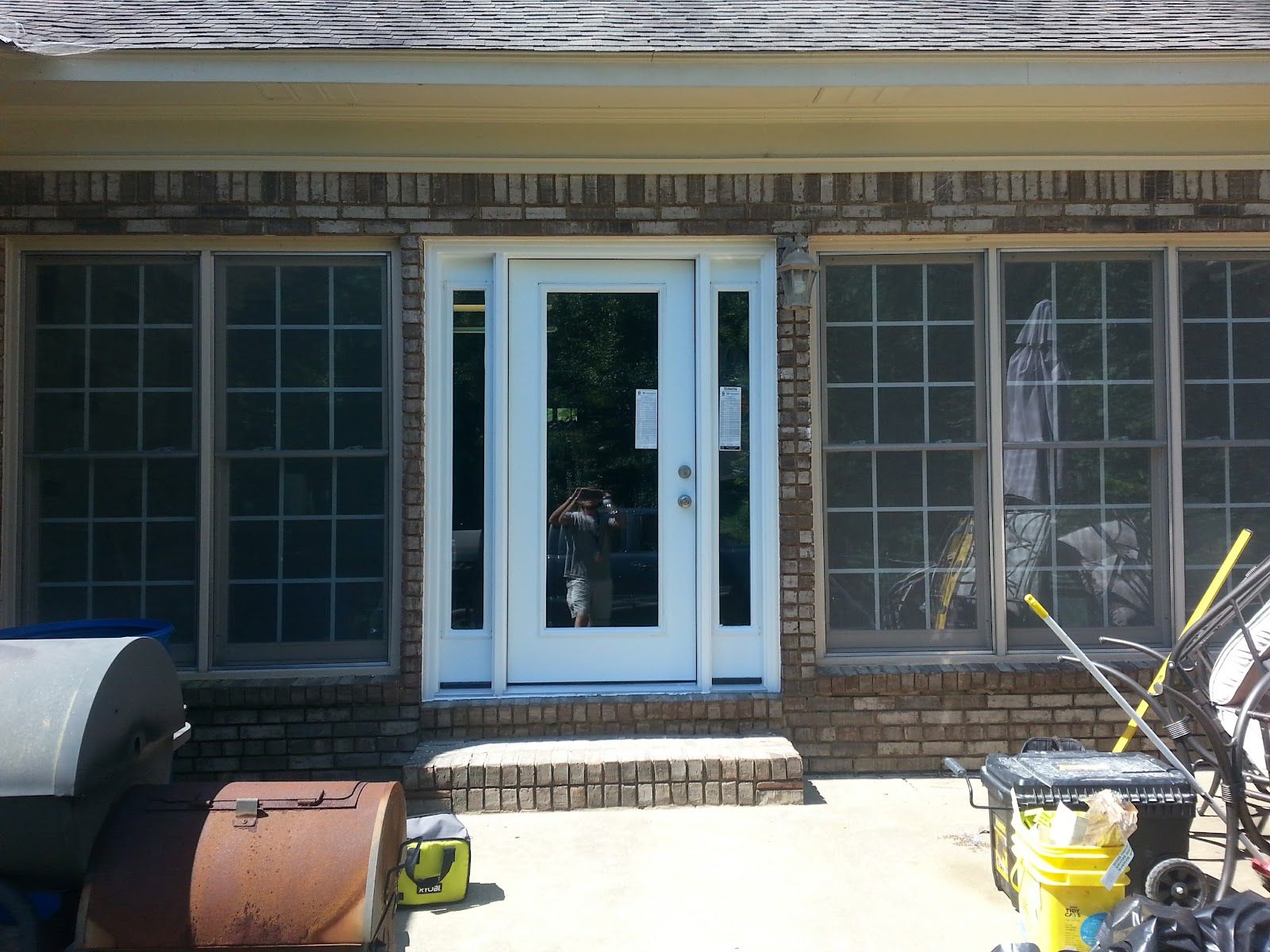New French patio door on a brick home